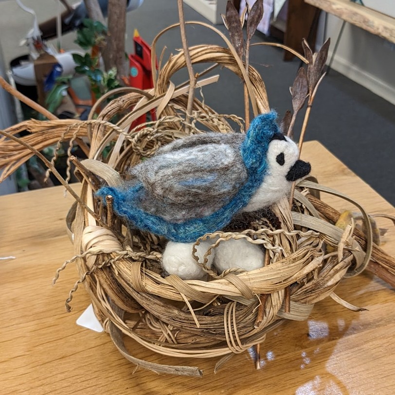 Felted bird in nest